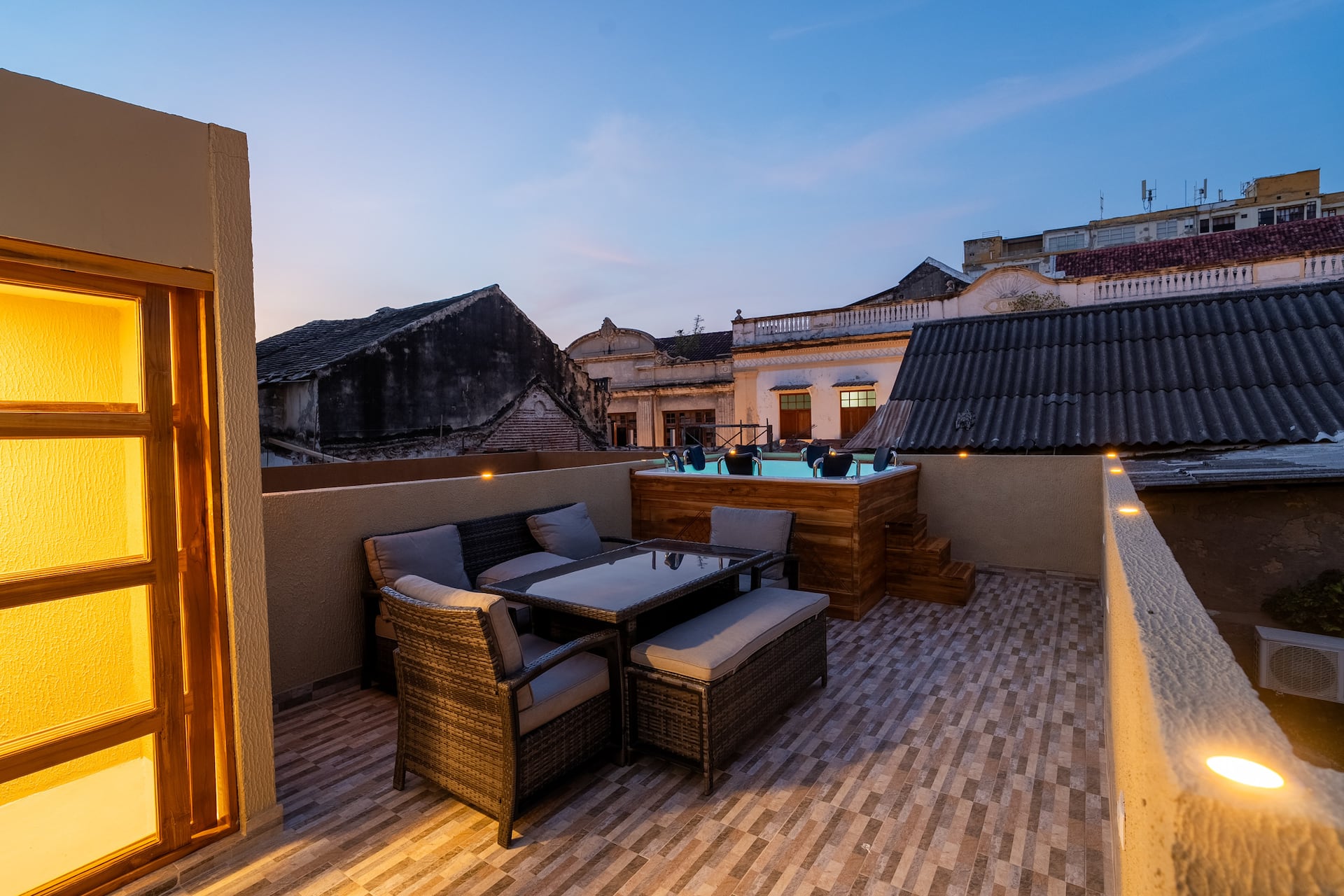 7BR Walled City Villa w/ Rooftop Spa & City Views Full Photo 6