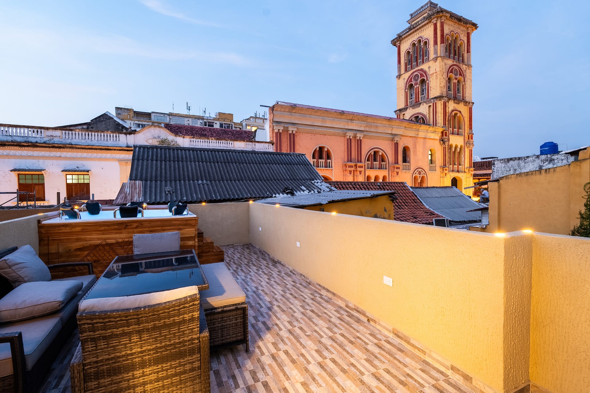 7BR Walled City Villa w/ Rooftop Spa & City Views Full Photo 10