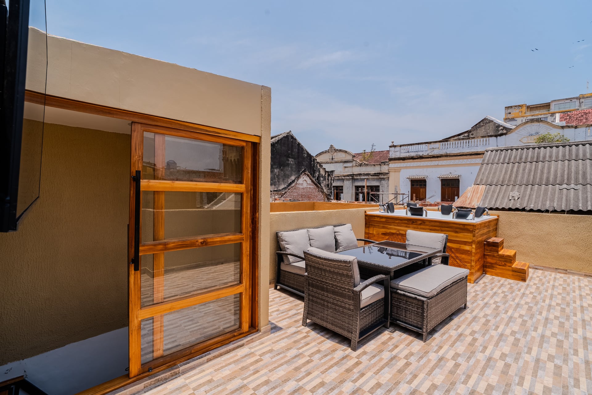 7BR Walled City Villa w/ Rooftop Spa & City Views Full Photo 12