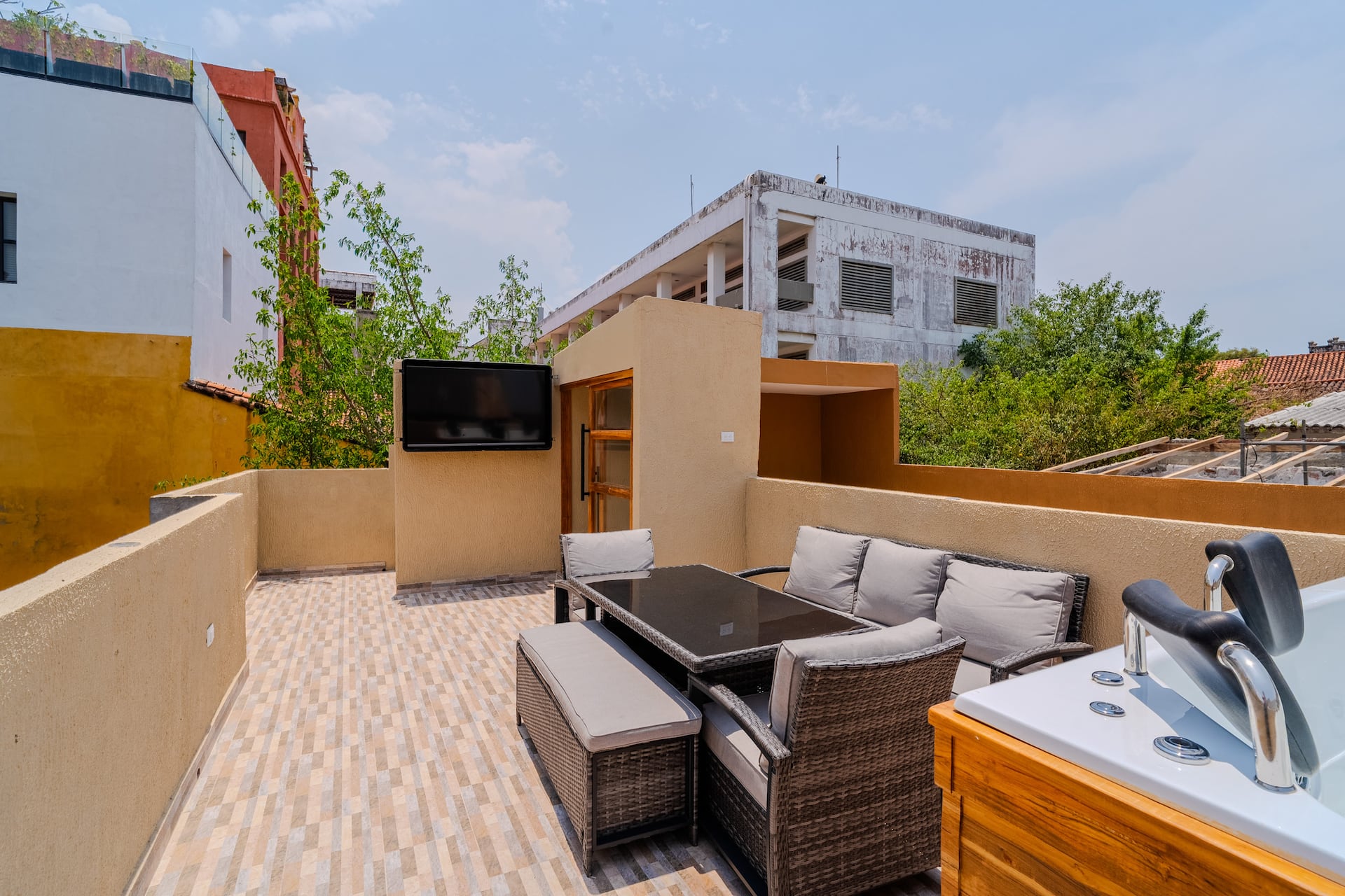 7BR Walled City Villa w/ Rooftop Spa & City Views Full Photo 13